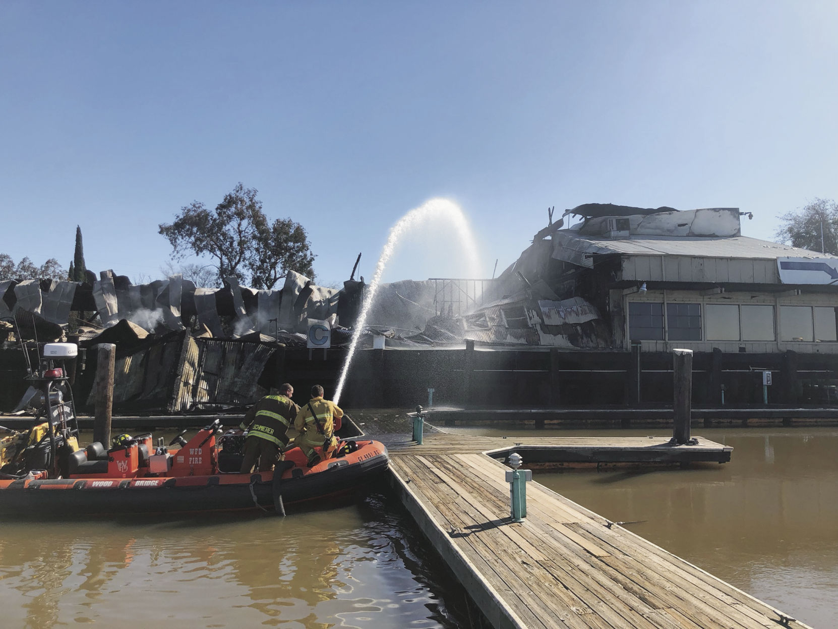 Local fires burn: Several businesses destroyed at Tower Park Marina